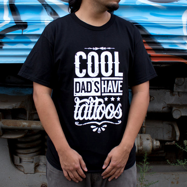 Pins & Bones Father's Day Cool Dad's Have Tattoos Black Cotton Shirt by pinsandbones.com is an awesome alternative shirt for the father who is tattoo'd and lives on the edge.